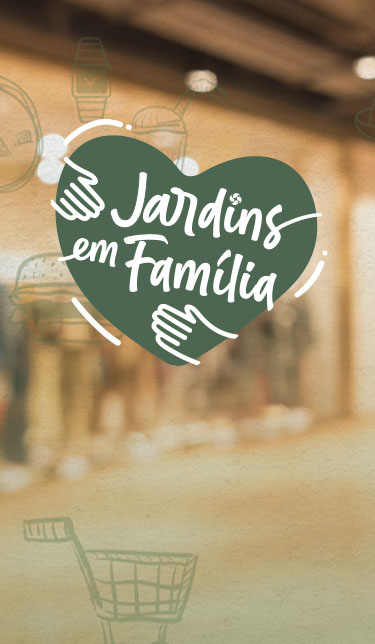 Corredor de shopping desfocado ao fundo, coração verde com mãos abraçando e o texto 'Jardins em Família'. Texto de apoio: Se tem novidade,  nossa comunidade fica sabendo primeiro